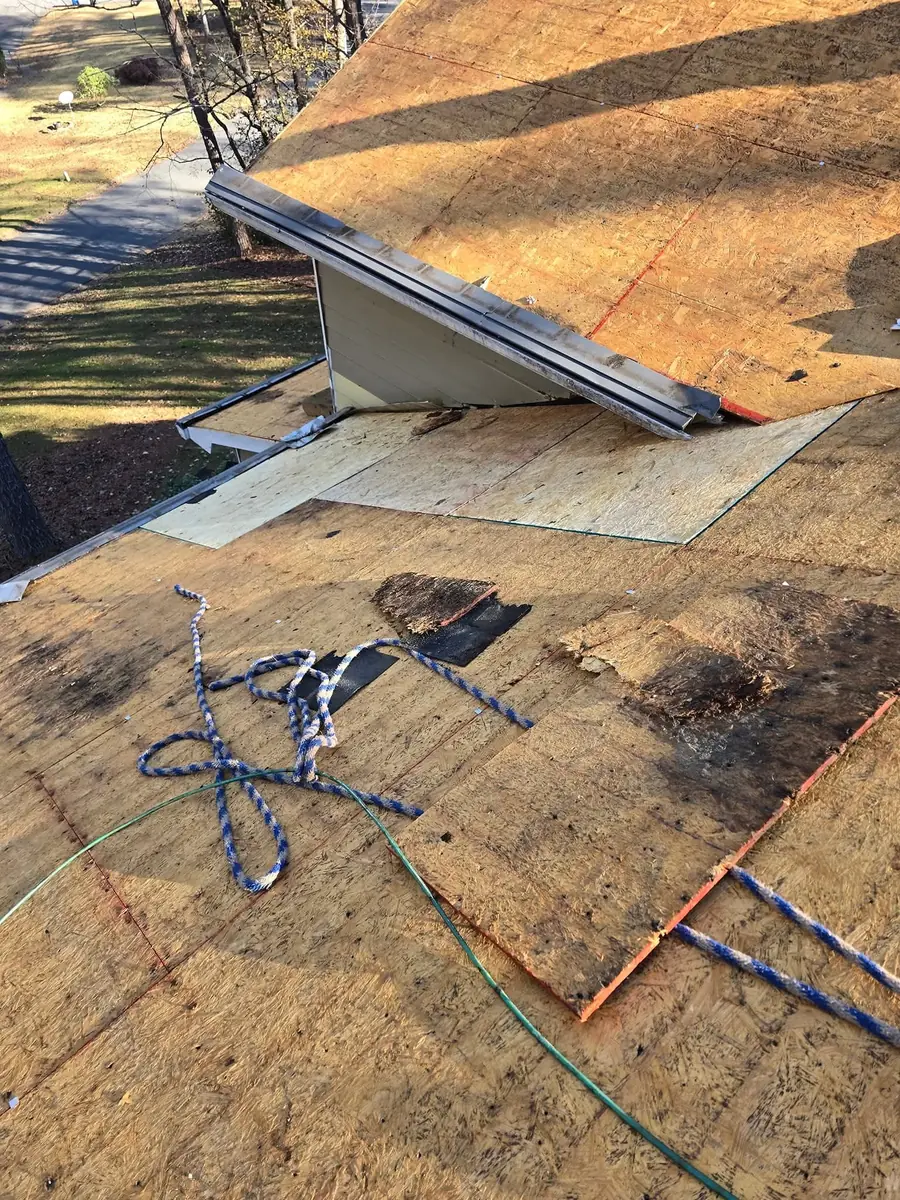 Exposed roof deck before new shingles